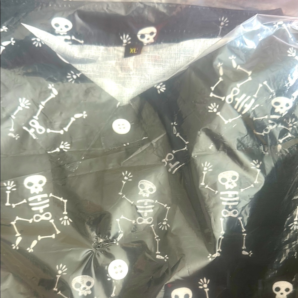 Black Skeleton Print Scrub Top